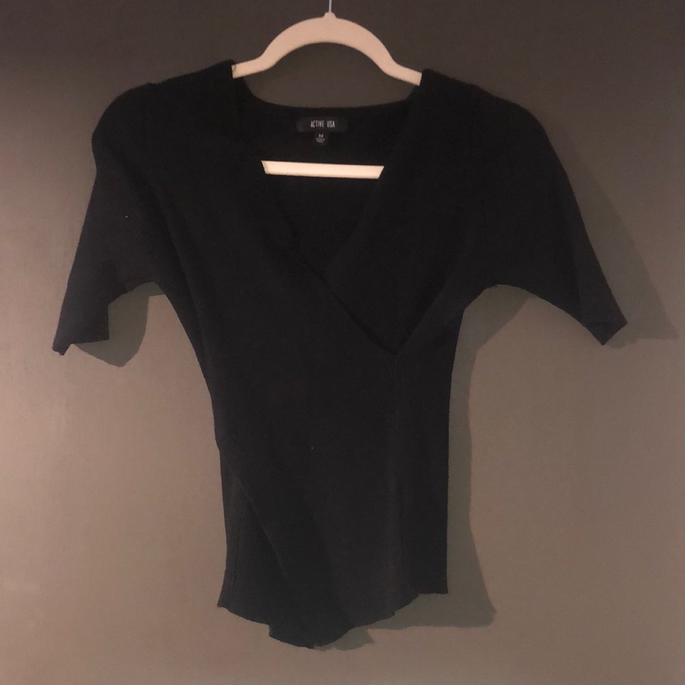Black wrap style top with v neckline